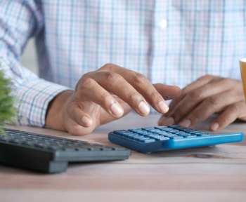 person using black computer keyboard