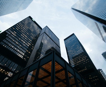 low angle photo of city high rise buildings during daytime