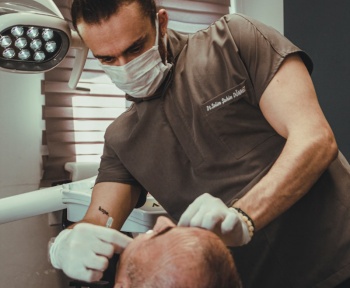 a dentist examining a patient