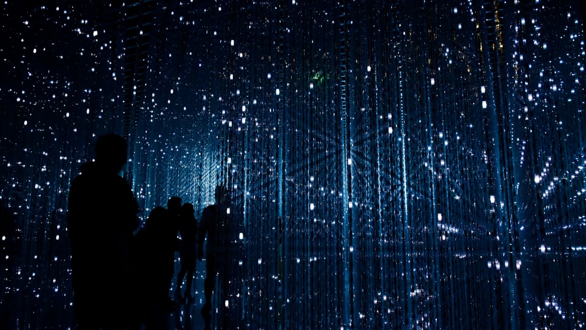 a group of people standing next to each other