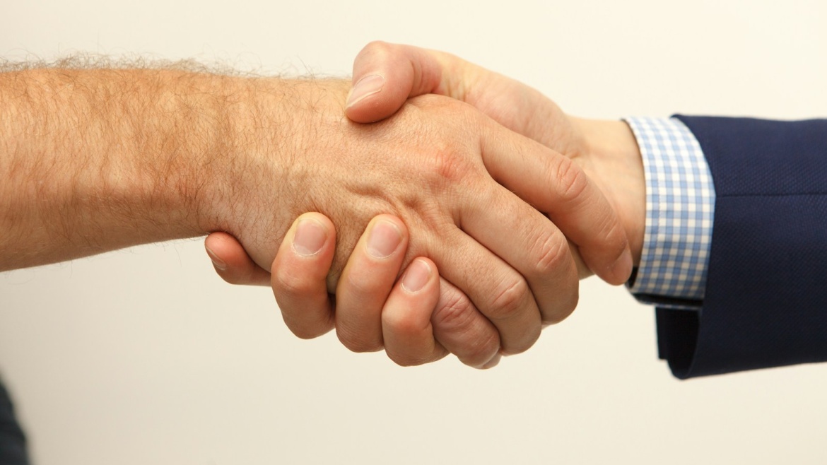 man and woman holding hands