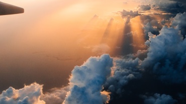 airplane on sky during golden hour