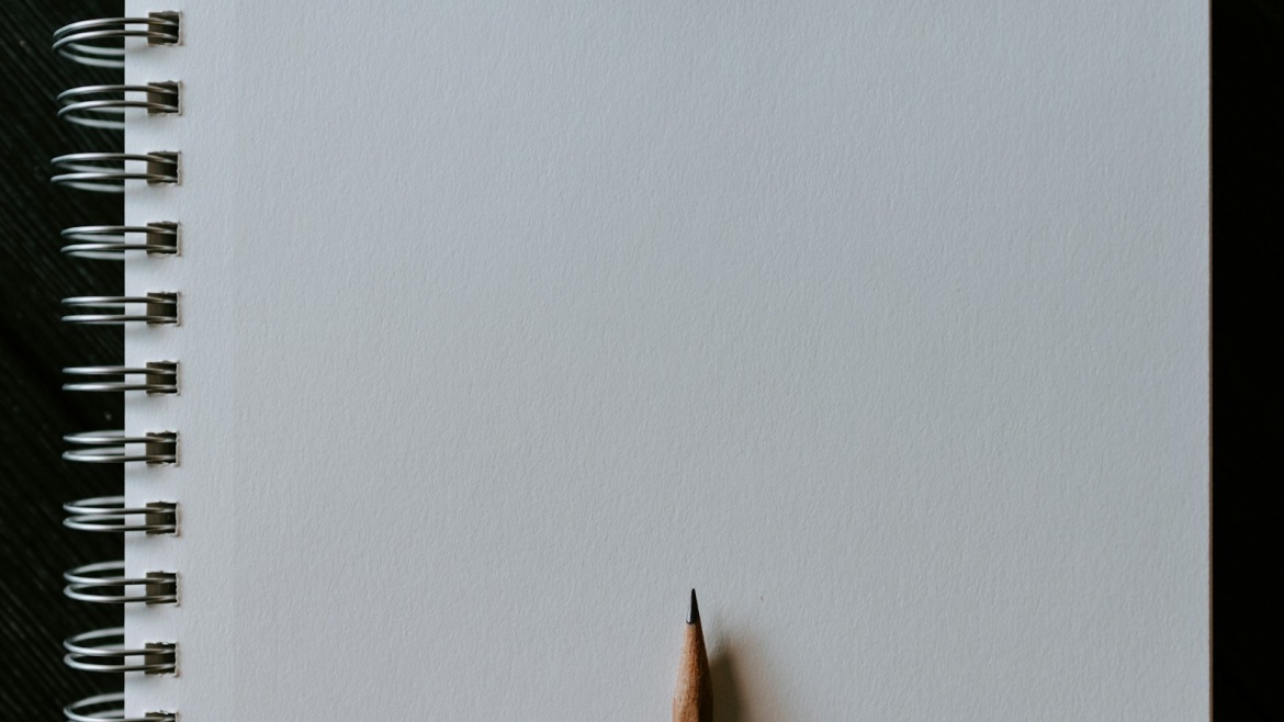 brown pencil on white surface