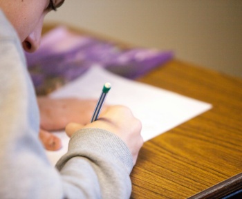 person using pencil