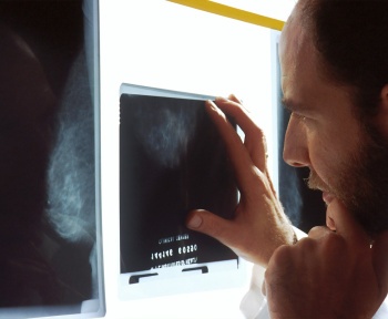 person holding black tablet computer